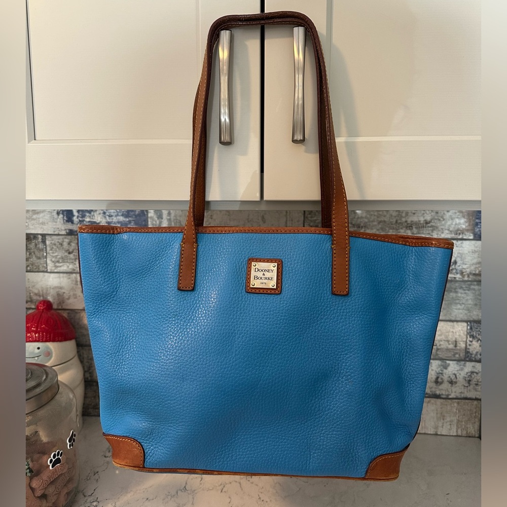 Dooney and Burke blue pocket book